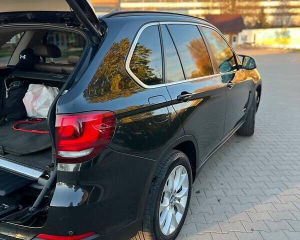 Черный БМВ Х5, объемом двигателя 2 л и пробегом 220 тыс. км за 24900 $, фото 148 на Automoto.ua
