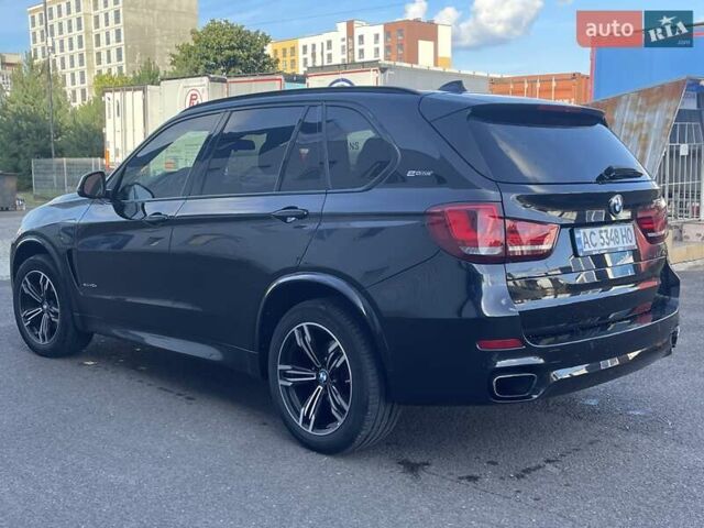 Чорний БМВ Х5, об'ємом двигуна 2 л та пробігом 195 тис. км за 33200 $, фото 3 на Automoto.ua