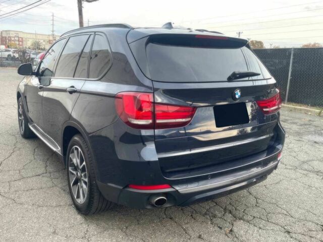 Чорний БМВ Х5, об'ємом двигуна 3 л та пробігом 58 тис. км за 21600 $, фото 5 на Automoto.ua