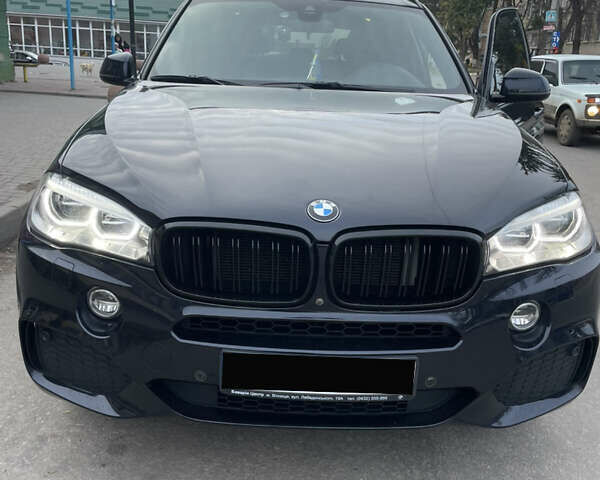 Черный БМВ Х5, объемом двигателя 2 л и пробегом 106 тыс. км за 39000 $, фото 1 на Automoto.ua