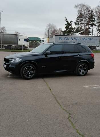 Чорний БМВ Х5, об'ємом двигуна 2 л та пробігом 200 тис. км за 26500 $, фото 2 на Automoto.ua