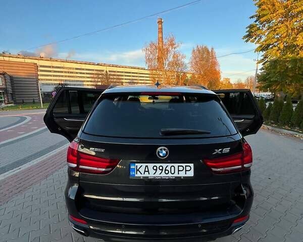 Черный БМВ Х5, объемом двигателя 2 л и пробегом 220 тыс. км за 24900 $, фото 52 на Automoto.ua