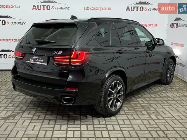 Чорний БМВ Х5, об'ємом двигуна 2.99 л та пробігом 178 тис. км за 38950 $, фото 2 на Automoto.ua