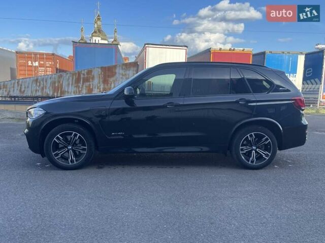 Чорний БМВ Х5, об'ємом двигуна 2 л та пробігом 195 тис. км за 33200 $, фото 2 на Automoto.ua