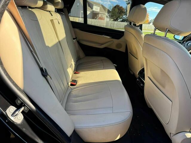 Чорний БМВ Х5, об'ємом двигуна 3 л та пробігом 64 тис. км за 17000 $, фото 13 на Automoto.ua