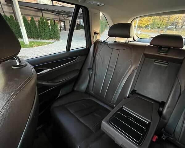 Черный БМВ Х5, объемом двигателя 2 л и пробегом 220 тыс. км за 24900 $, фото 102 на Automoto.ua