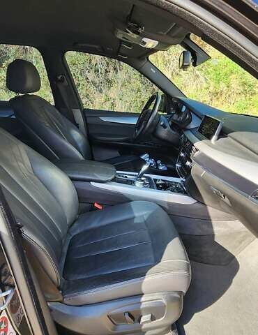 Черный БМВ Х5, объемом двигателя 2 л и пробегом 107 тыс. км за 32000 $, фото 5 на Automoto.ua