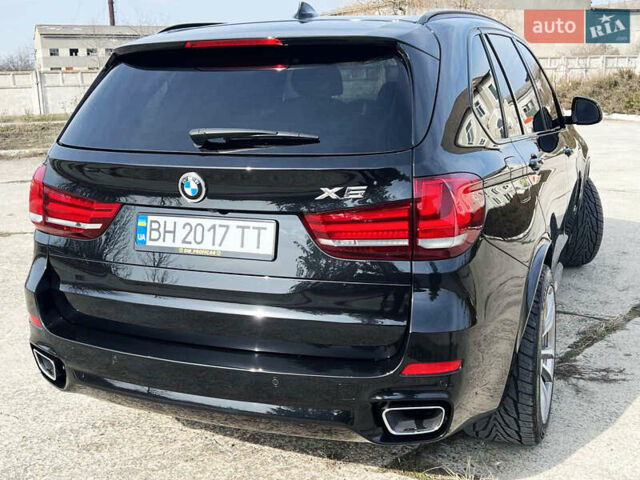 Черный БМВ Х5, объемом двигателя 3 л и пробегом 73 тыс. км за 43000 $, фото 6 на Automoto.ua