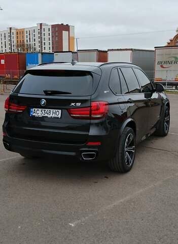 Чорний БМВ Х5, об'ємом двигуна 2 л та пробігом 200 тис. км за 26500 $, фото 5 на Automoto.ua