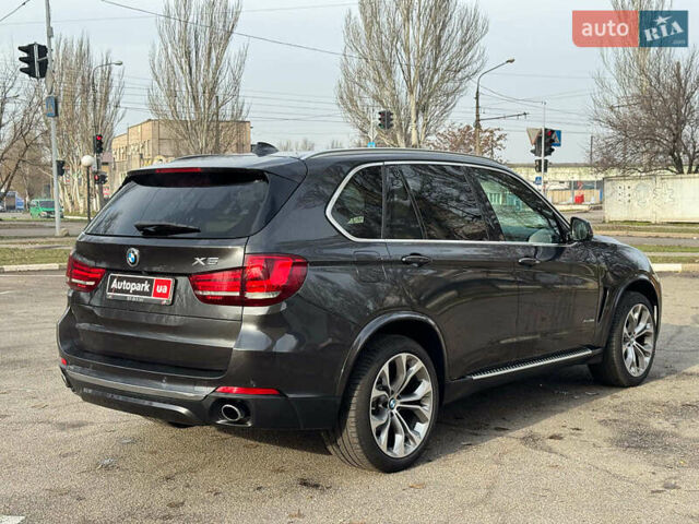 Чорний БМВ Х5, об'ємом двигуна 3 л та пробігом 110 тис. км за 28490 $, фото 4 на Automoto.ua