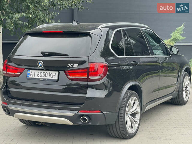 Черный БМВ Х5, объемом двигателя 3 л и пробегом 126 тыс. км за 32000 $, фото 12 на Automoto.ua