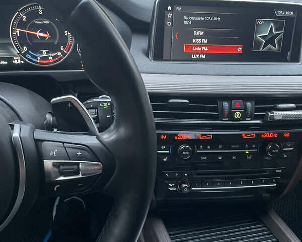 Черный БМВ Х5, объемом двигателя 2 л и пробегом 106 тыс. км за 39000 $, фото 6 на Automoto.ua