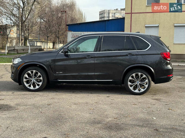 Чорний БМВ Х5, об'ємом двигуна 3 л та пробігом 110 тис. км за 28490 $, фото 1 на Automoto.ua