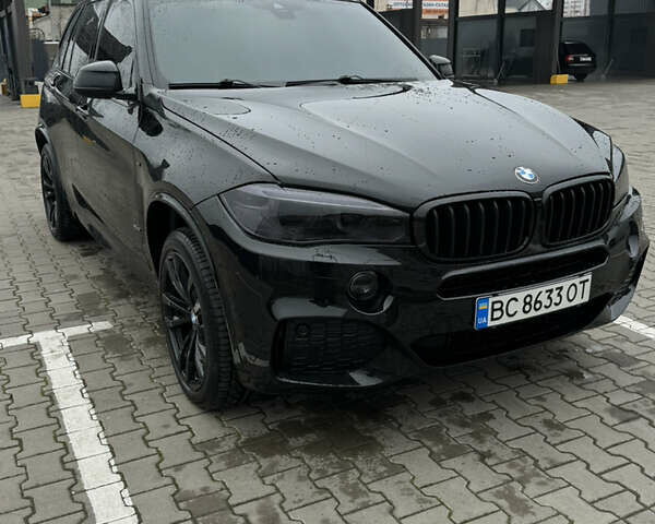 Черный БМВ Х5, объемом двигателя 2 л и пробегом 250 тыс. км за 28000 $, фото 1 на Automoto.ua