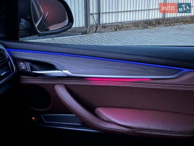 Черный БМВ Х5, объемом двигателя 2 л и пробегом 235 тыс. км за 25700 $, фото 1 на Automoto.ua