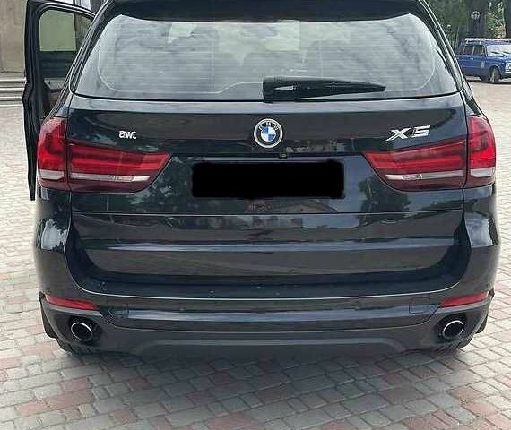 Чорний БМВ Х5, об'ємом двигуна 2 л та пробігом 145 тис. км за 21000 $, фото 3 на Automoto.ua