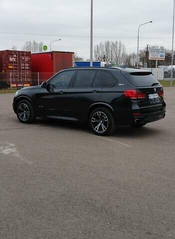 Чорний БМВ Х5, об'ємом двигуна 2 л та пробігом 200 тис. км за 26500 $, фото 3 на Automoto.ua
