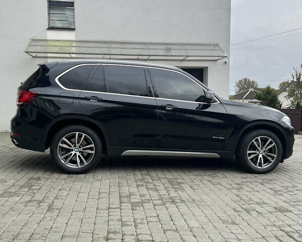 Черный БМВ Х5, объемом двигателя 3 л и пробегом 150 тыс. км за 44900 $, фото 43 на Automoto.ua