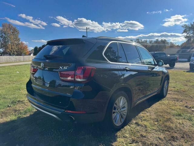 Чорний БМВ Х5, об'ємом двигуна 3 л та пробігом 64 тис. км за 17000 $, фото 4 на Automoto.ua