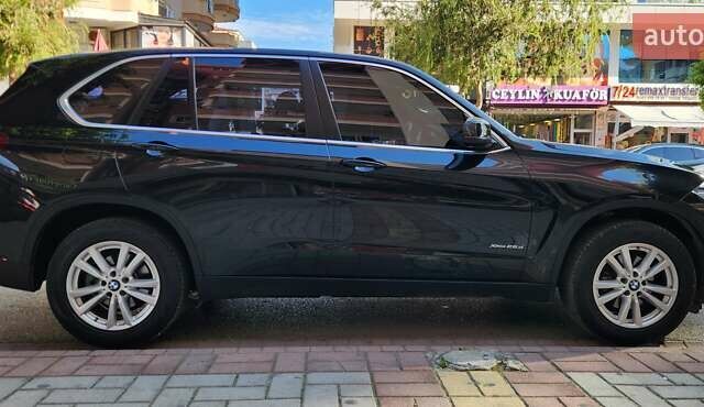 Черный БМВ Х5, объемом двигателя 2 л и пробегом 107 тыс. км за 32000 $, фото 4 на Automoto.ua