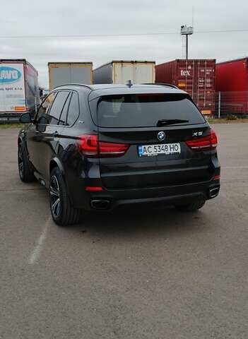 Чорний БМВ Х5, об'ємом двигуна 2 л та пробігом 200 тис. км за 26500 $, фото 6 на Automoto.ua