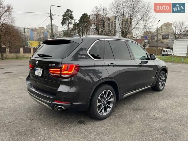 Черный БМВ Х5, объемом двигателя 2 л и пробегом 142 тыс. км за 25000 $, фото 1 на Automoto.ua
