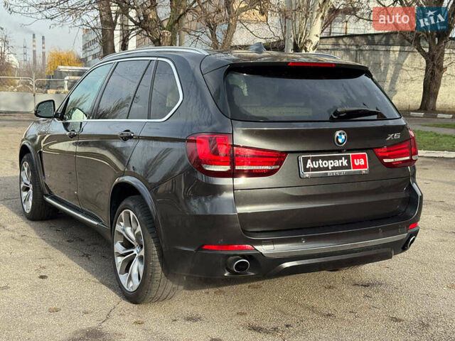 Чорний БМВ Х5, об'ємом двигуна 3 л та пробігом 110 тис. км за 28490 $, фото 2 на Automoto.ua