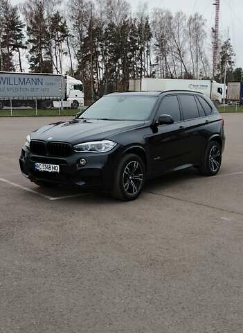 Чорний БМВ Х5, об'ємом двигуна 2 л та пробігом 200 тис. км за 26500 $, фото 1 на Automoto.ua