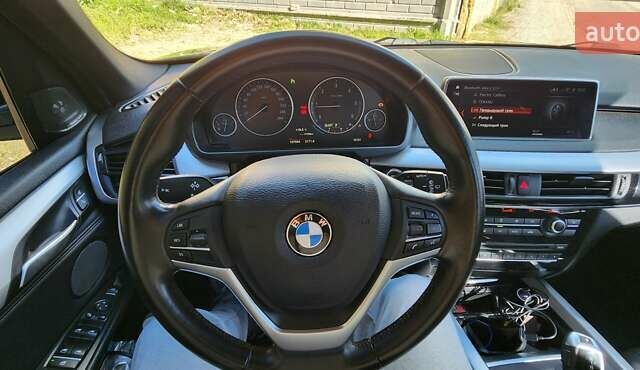 Черный БМВ Х5, объемом двигателя 2 л и пробегом 107 тыс. км за 32000 $, фото 2 на Automoto.ua