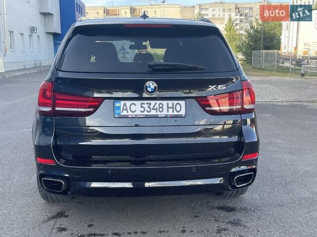 Чорний БМВ Х5, об'ємом двигуна 2 л та пробігом 195 тис. км за 33200 $, фото 4 на Automoto.ua
