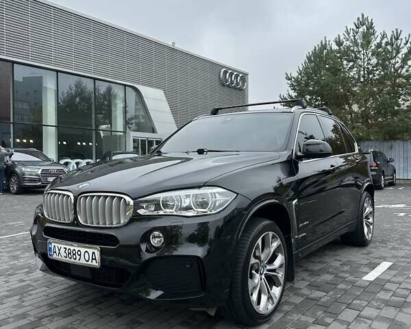 Черный БМВ Х5, объемом двигателя 2 л и пробегом 107 тыс. км за 33000 $, фото 1 на Automoto.ua