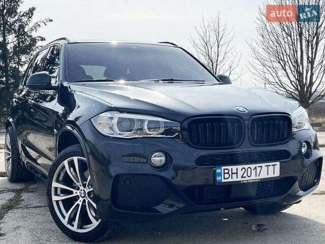Черный БМВ Х5, объемом двигателя 3 л и пробегом 73 тыс. км за 43000 $, фото 2 на Automoto.ua