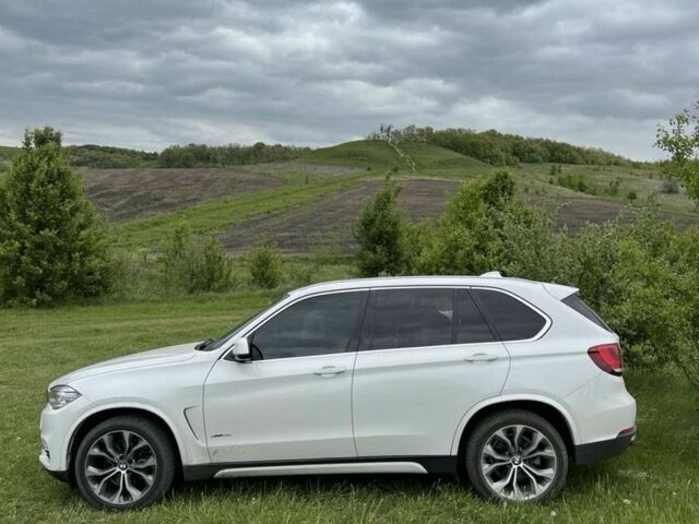 Черный БМВ Х5, объемом двигателя 3.7 л и пробегом 210 тыс. км за 25900 $, фото 1 на Automoto.ua