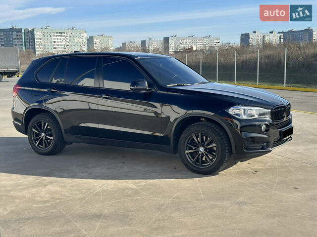 Черный БМВ Х5, объемом двигателя 2 л и пробегом 120 тыс. км за 28800 $, фото 1 на Automoto.ua