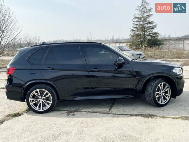 Черный БМВ Х5, объемом двигателя 3 л и пробегом 73 тыс. км за 43000 $, фото 4 на Automoto.ua