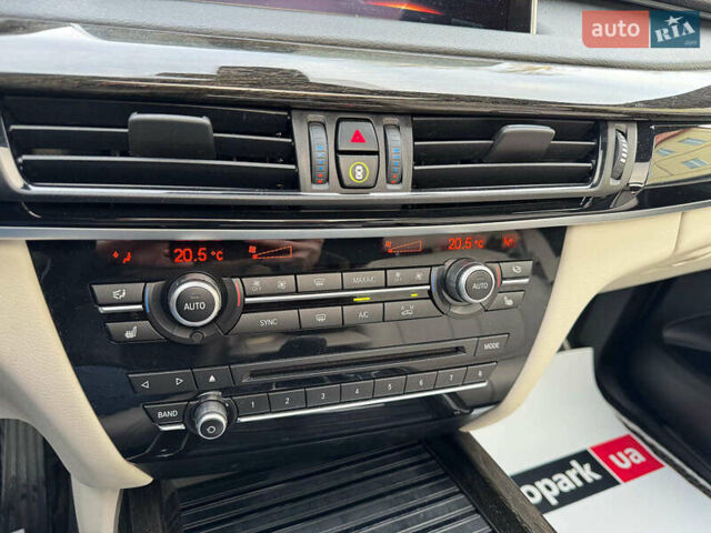 Чорний БМВ Х5, об'ємом двигуна 3 л та пробігом 110 тис. км за 28490 $, фото 28 на Automoto.ua