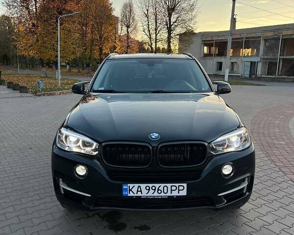 Черный БМВ Х5, объемом двигателя 2 л и пробегом 220 тыс. км за 24900 $, фото 1 на Automoto.ua