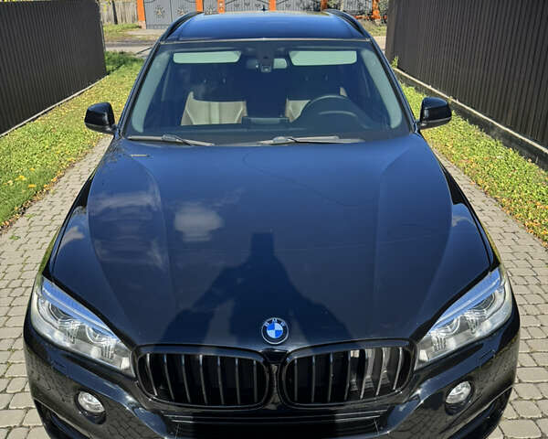 Черный БМВ Х5, объемом двигателя 2 л и пробегом 223 тыс. км за 26300 $, фото 2 на Automoto.ua