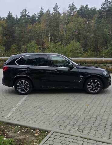 Черный БМВ Х5, объемом двигателя 2.98 л и пробегом 121 тыс. км за 28099 $, фото 1 на Automoto.ua