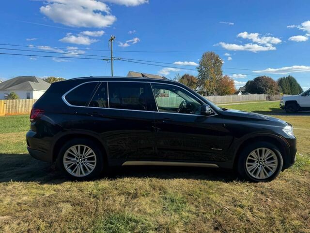 Чорний БМВ Х5, об'ємом двигуна 3 л та пробігом 64 тис. км за 17000 $, фото 7 на Automoto.ua