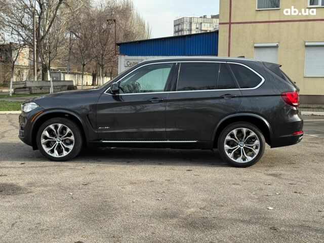 Чорний БМВ Х5, об'ємом двигуна 3 л та пробігом 110 тис. км за 28490 $, фото 1 на Automoto.ua