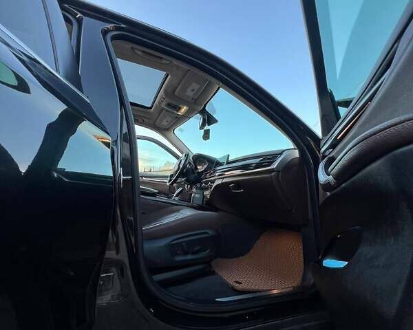 Черный БМВ Х5, объемом двигателя 2 л и пробегом 220 тыс. км за 24900 $, фото 49 на Automoto.ua