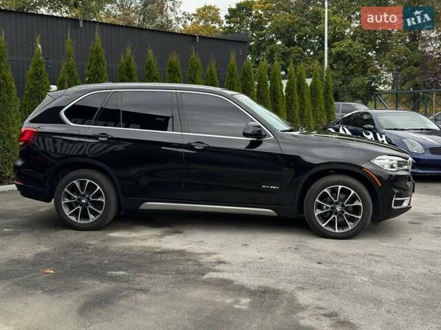 Черный БМВ Х5, объемом двигателя 3 л и пробегом 236 тыс. км за 26999 $, фото 1 на Automoto.ua