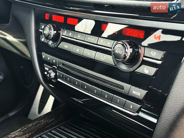 Черный БМВ Х5, объемом двигателя 3 л и пробегом 73 тыс. км за 43000 $, фото 20 на Automoto.ua