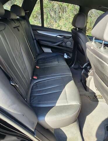 Черный БМВ Х5, объемом двигателя 2 л и пробегом 107 тыс. км за 32000 $, фото 1 на Automoto.ua