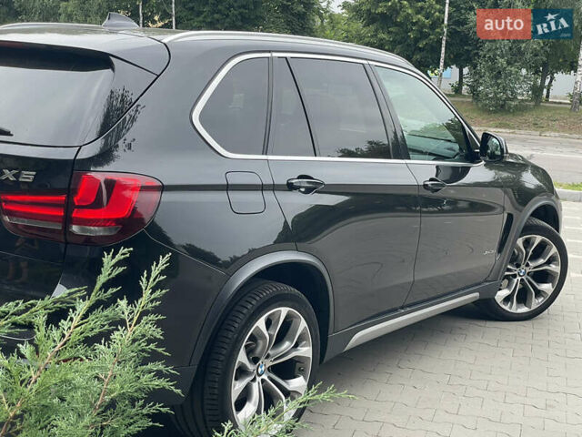 Черный БМВ Х5, объемом двигателя 3 л и пробегом 126 тыс. км за 32000 $, фото 6 на Automoto.ua