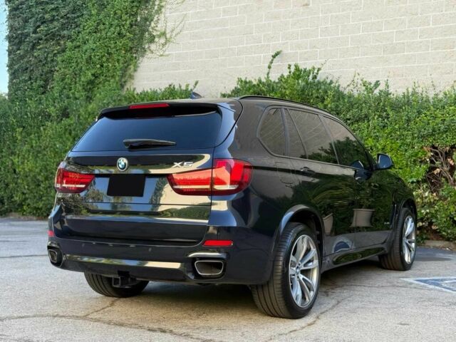 Чорний БМВ Х5, об'ємом двигуна 3 л та пробігом 62 тис. км за 24900 $, фото 5 на Automoto.ua