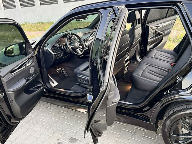 Чорний БМВ Х5, об'ємом двигуна 3 л та пробігом 155 тис. км за 45700 $, фото 4 на Automoto.ua