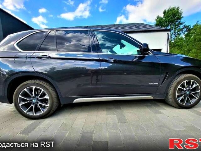 Черный БМВ Х5, объемом двигателя 4.4 л и пробегом 120 тыс. км за 13500 $, фото 1 на Automoto.ua