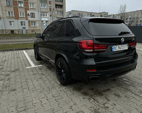 Черный БМВ Х5, объемом двигателя 2 л и пробегом 250 тыс. км за 28000 $, фото 2 на Automoto.ua